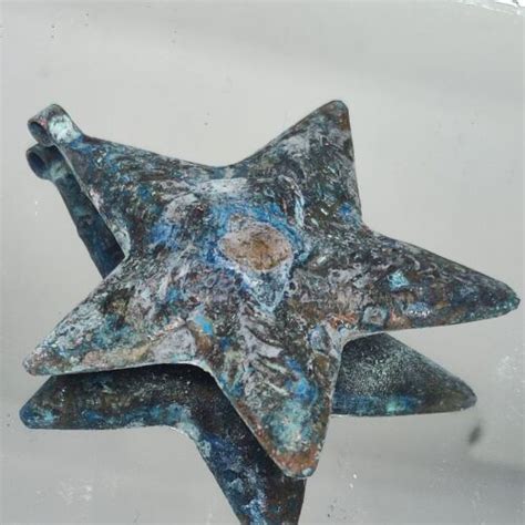 Bronze star amulet